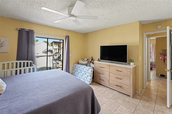 a bathroom with a sink vanity mirror and toilet