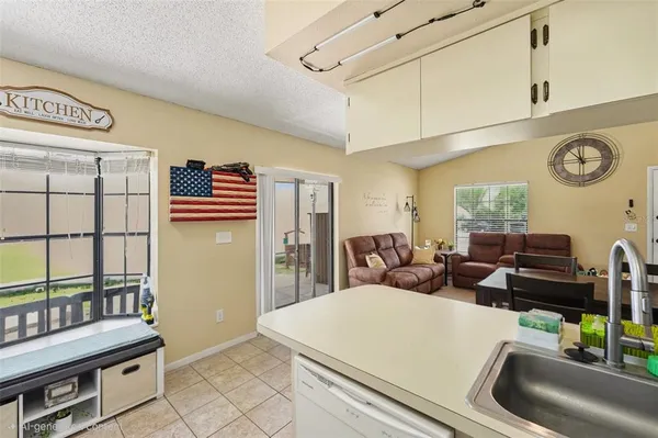 a living room with furniture and a table