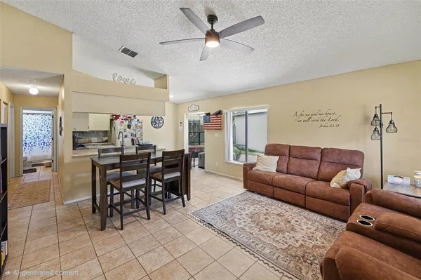 a living room with furniture a dining table and a piano