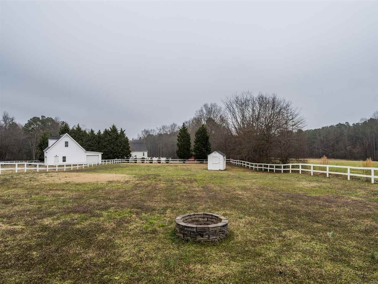 7273 Turner Fish Road Willow Spring, NC 27592 - Photo 23 of 25 The storage shed conveys with the sale of this home. Back Yard