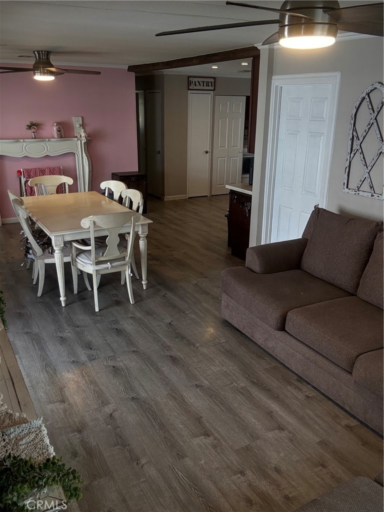 626 Dearborn, Unit 7 Redlands, CA 92374 - Photo 2 of 12 a living room with furniture and a wooden floor