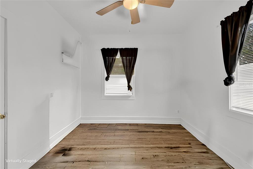 520 Dora Avenue Tavares, FL 32778 - Photo 13 of 17 a view of a livingroom with wooden floor