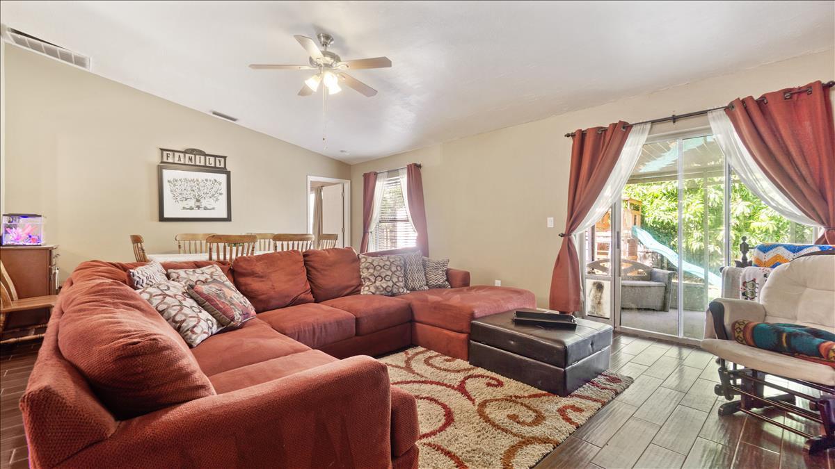 7220 Freeport Road Cocoa, FL 32927 - Photo 17 of 25 a living room with furniture and a large window