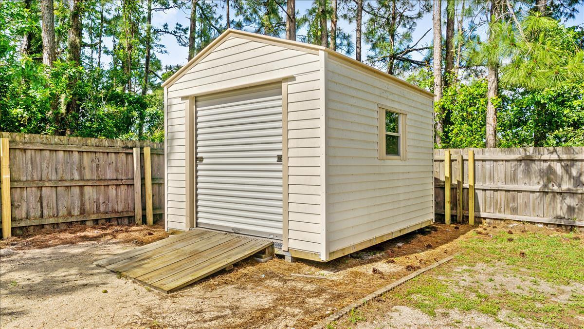 7220 Freeport Road Cocoa, FL 32927 - Photo 4 of 25 a view of a backyard