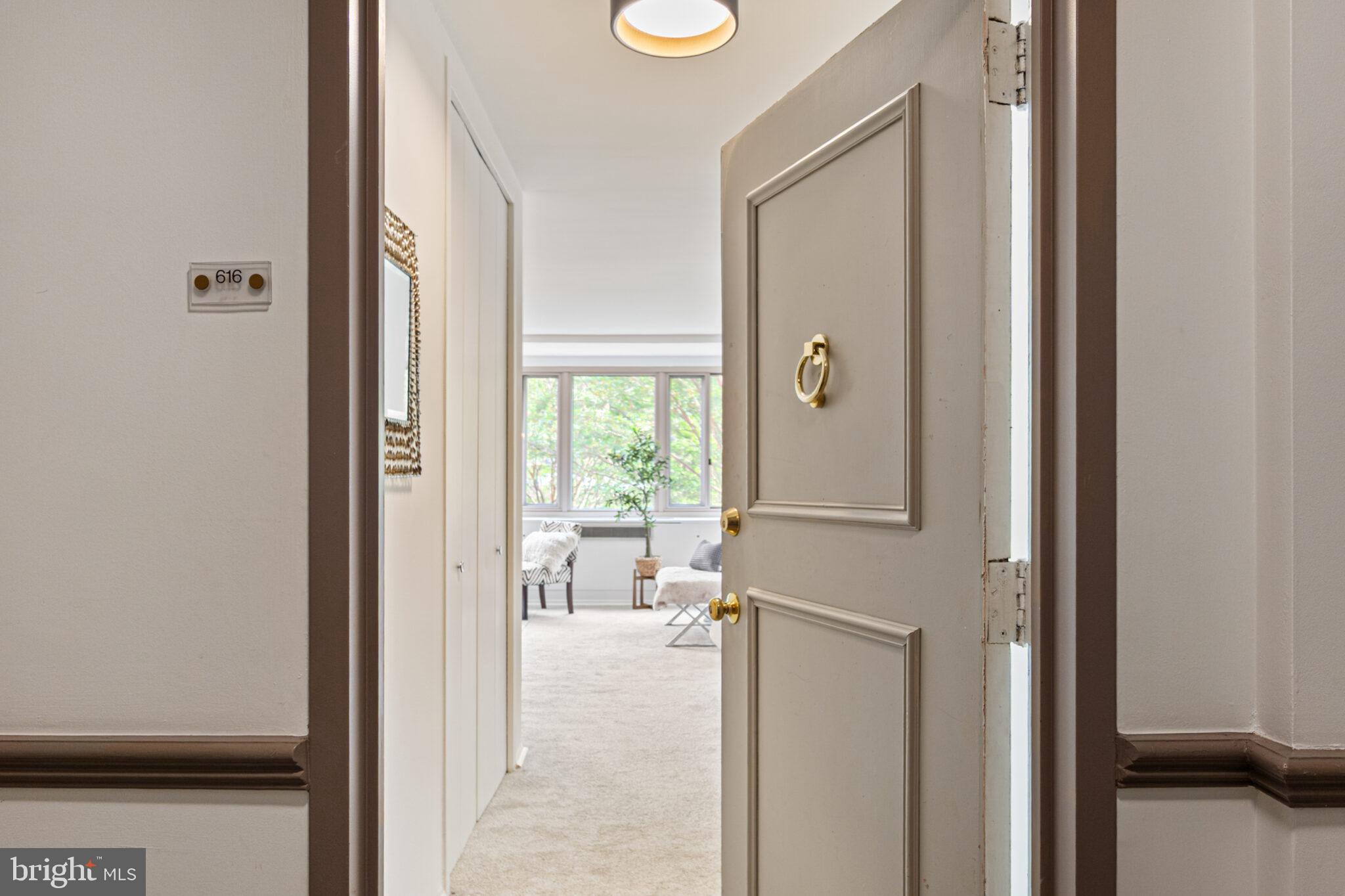 a view of a livingroom with furniture and windows