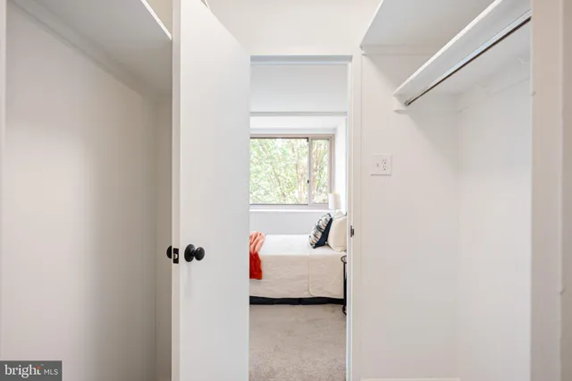 a bathroom with a sink and a window
