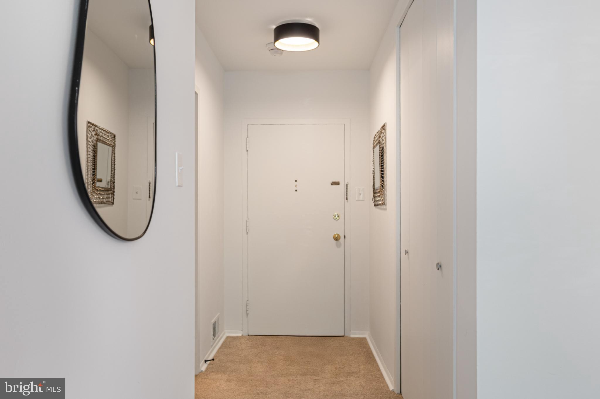 4101 Cathedral Avenue Northwest, Unit 616 Washington, DC 20016 - Photo 2 of 27 a view of a livingroom with an entryway
