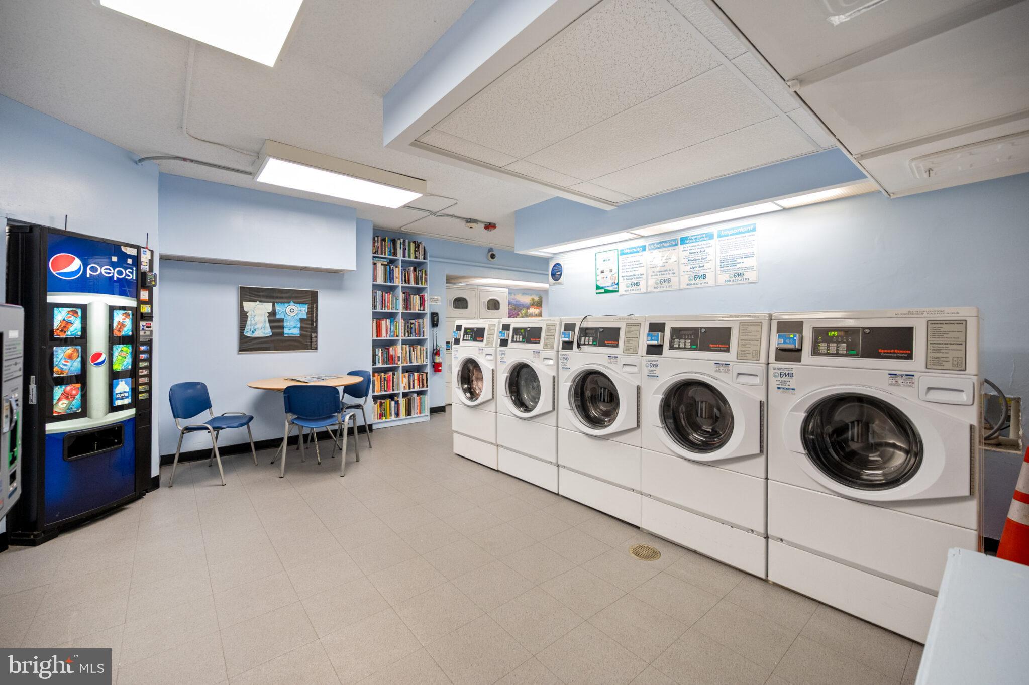 4101 Cathedral Avenue Northwest, Unit 616 Washington, DC 20016 - Photo 23 of 27 a utility room with dryer and washer