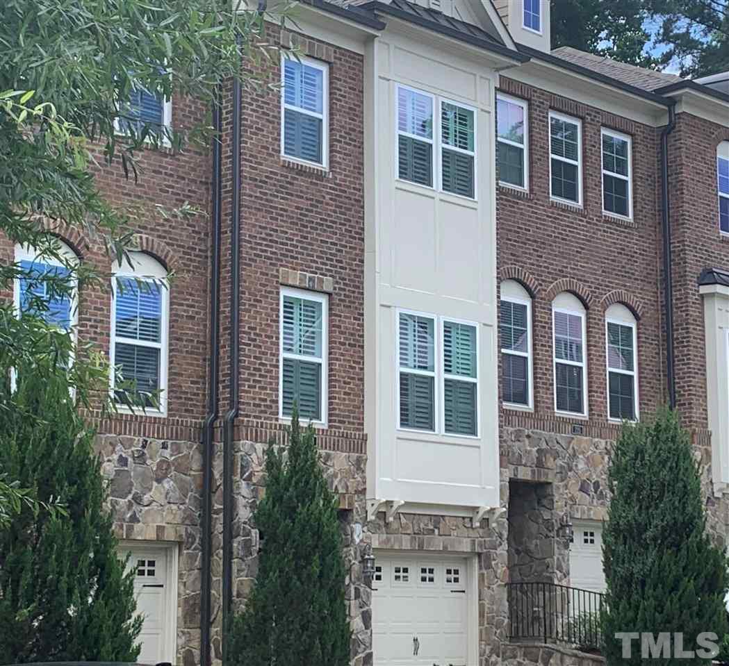 225 Penley Circle Raleigh, NC 27609 - Photo 1 of 18 a front view of a house with a yard