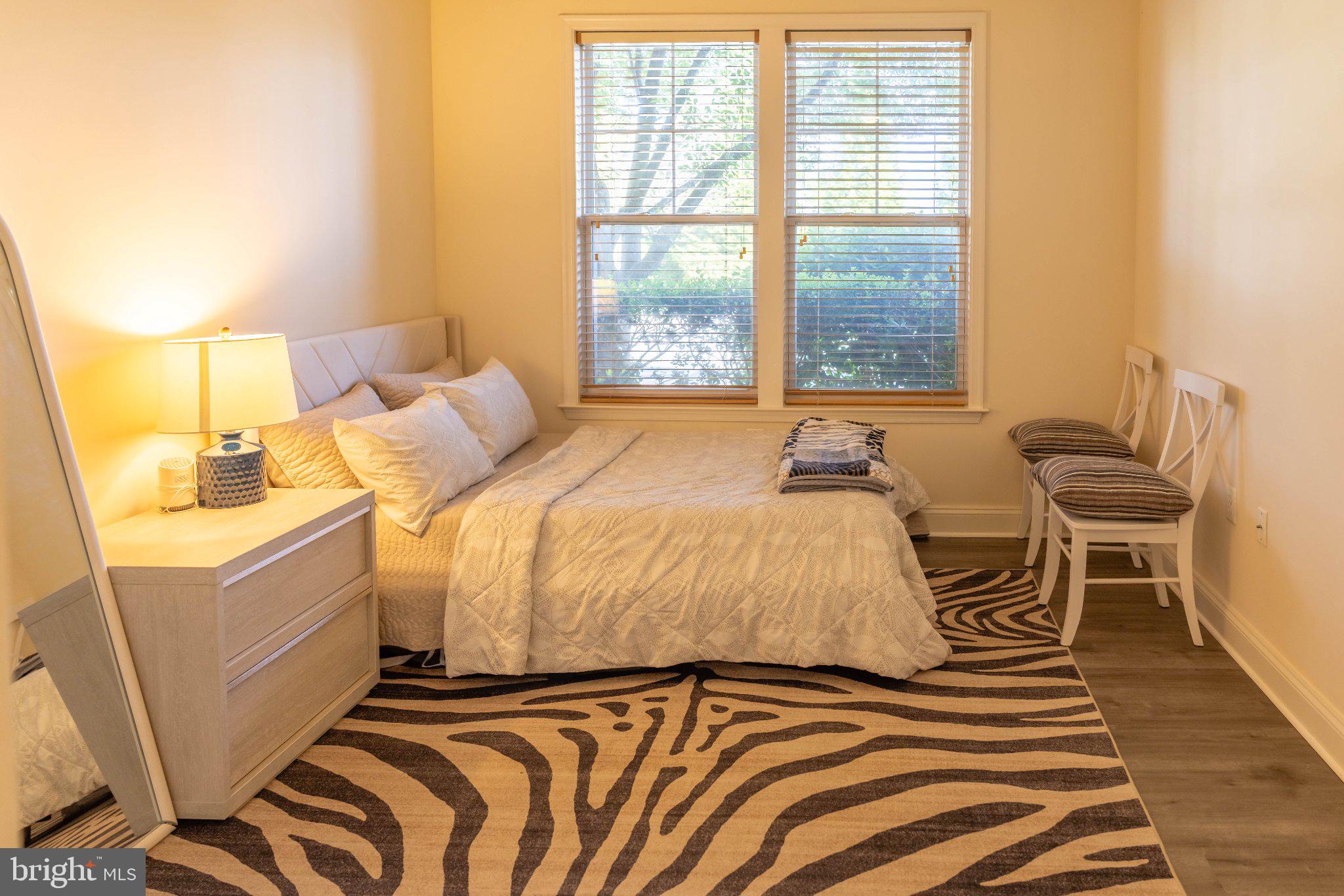 12824 Clarksburg Square Road, Unit 105 Clarksburg, MD 20871 - Photo 58 of 96 Serene bedroom with natural light.