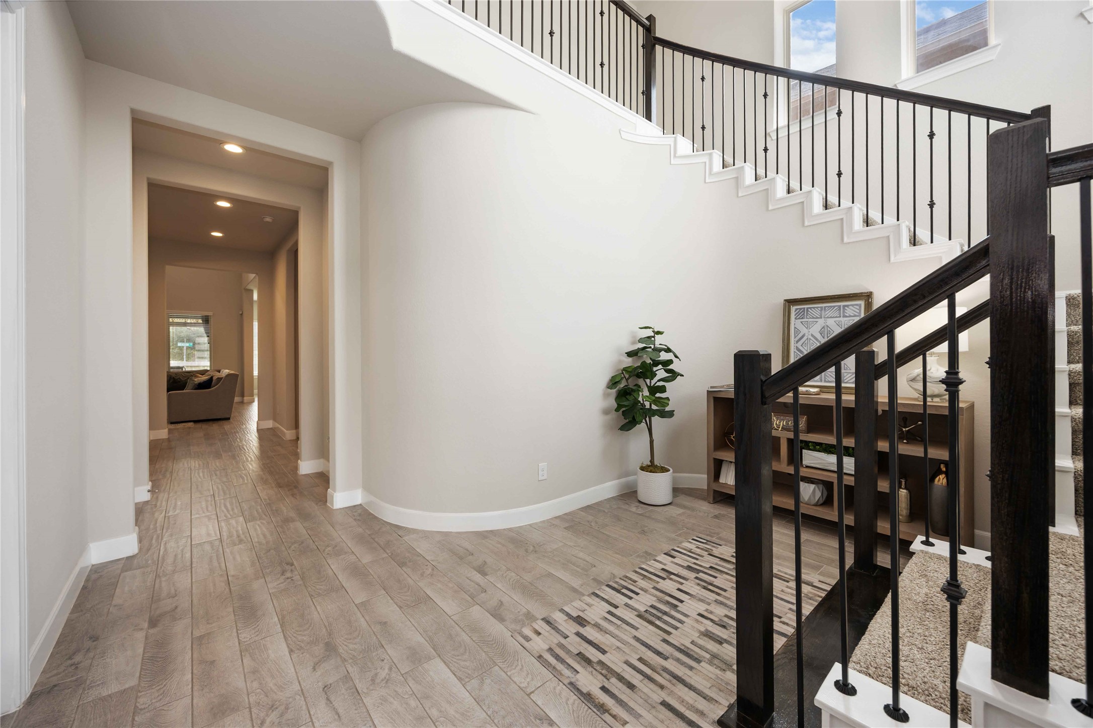 5822 Euclid Loop Rosenberg, TX 77469 - Photo 4 of 35 Wood-look tile through-out the main living areas.