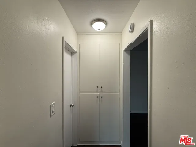 a bathroom with a mirror and a shower