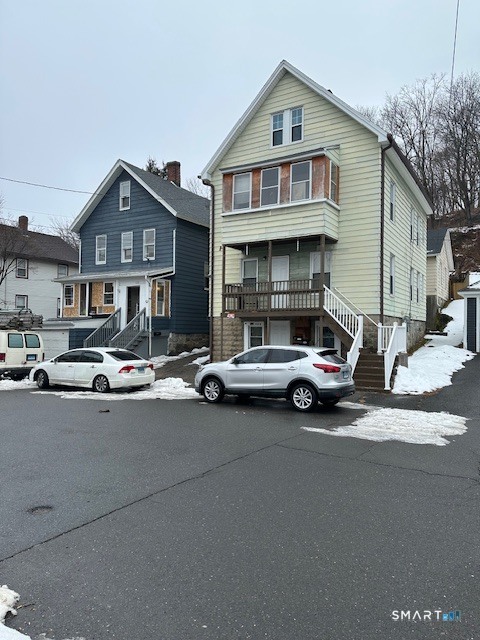 126 Smith Street, Unit 3 Derby, CT 06418 - Photo 1 of 10 a car parked in front of a house