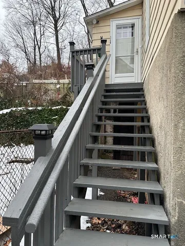 a view of a balcony with an outdoor space