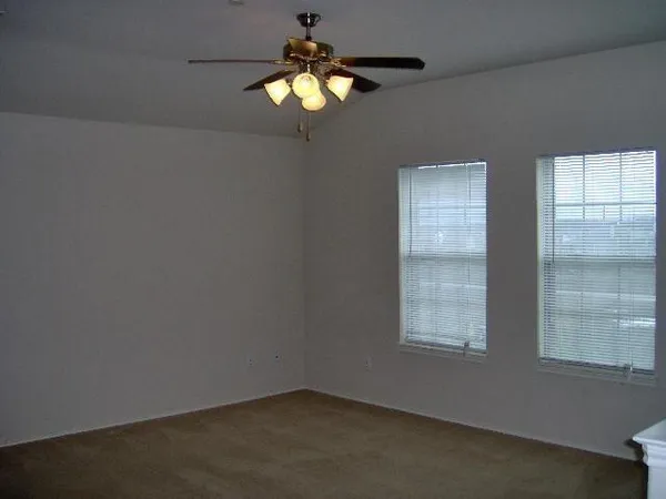 a kitchen with a sink stove and microwave