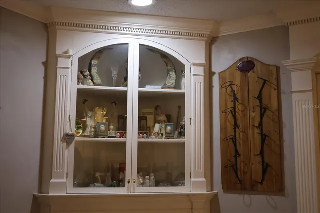 a view of a entryway door and hallway