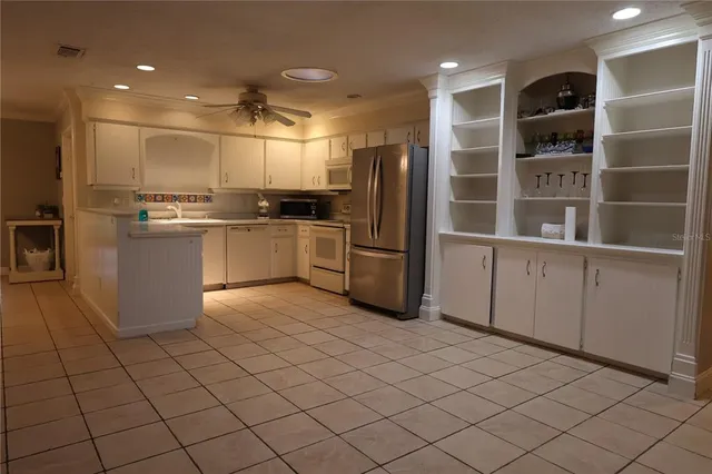 a view of a living room and entryway