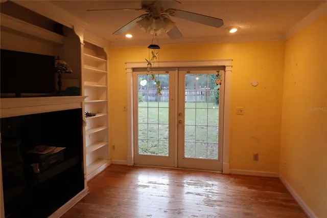 a view of a livingroom with wooden floor