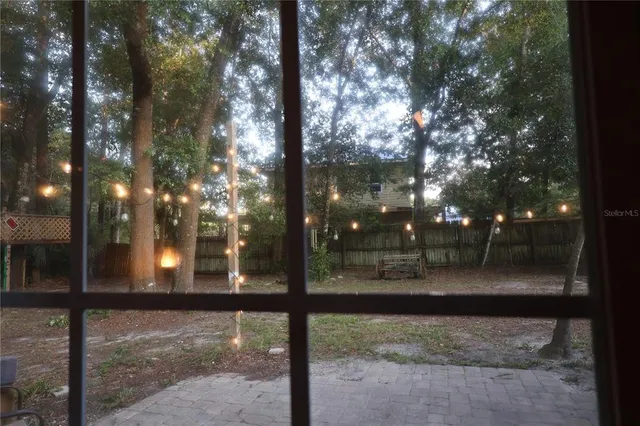 a kitchen with cabinets appliances and a counter top space