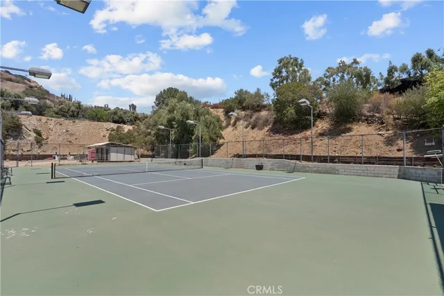 a view of a road with trees