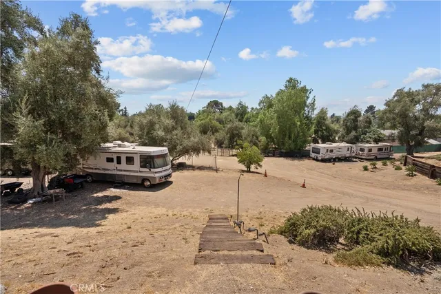 a view of a street with sitting area