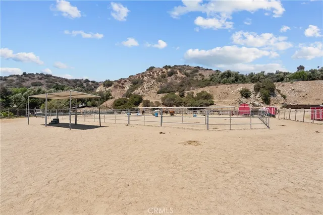 a view of outdoor space with seating area and barbeque oven