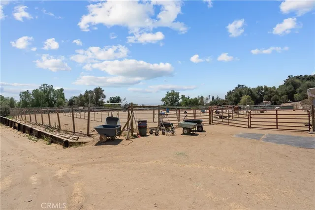 a view of a swimming pool with a yard