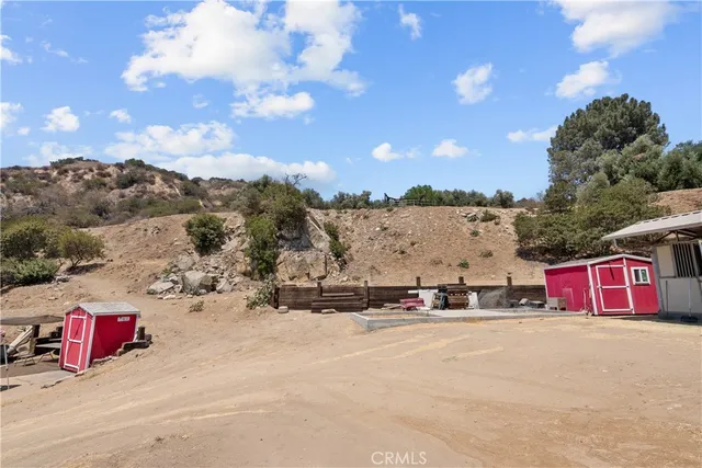 a view of a yard with a mountain