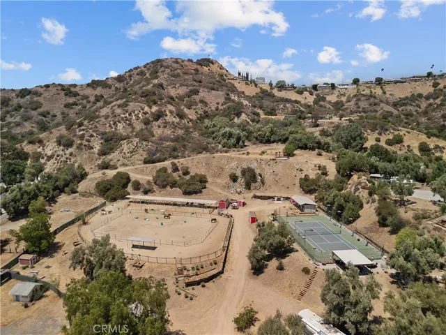 a view of a swimming pool with a yard