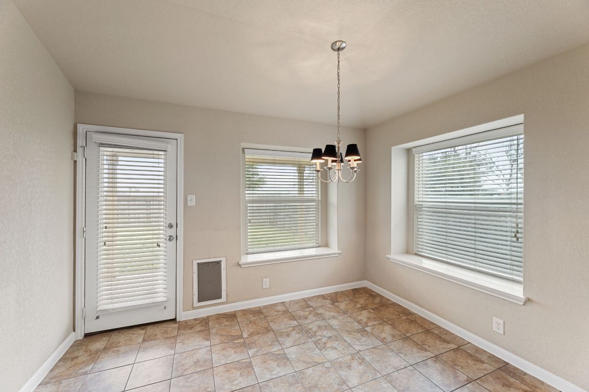 582 Briggs Drive New Braunfels, TX 78130 - Photo 12 of 32 a view of an empty room with a window