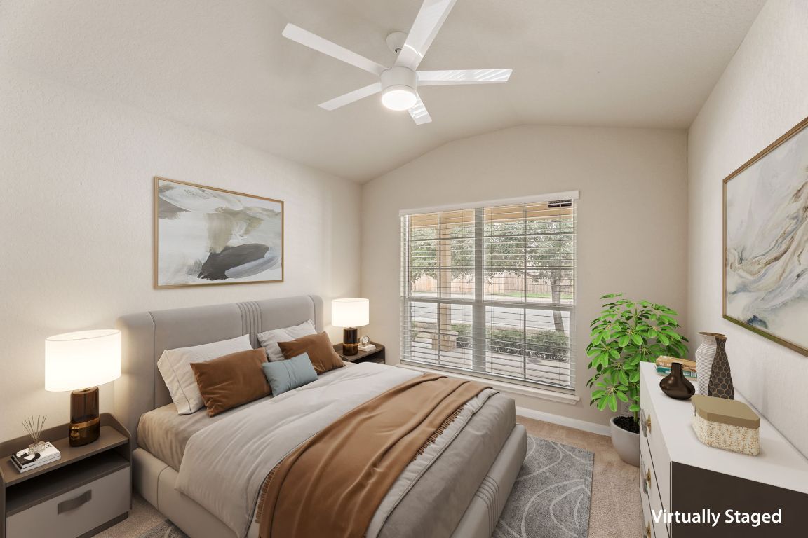 582 Briggs Drive New Braunfels, TX 78130 - Photo 23 of 32 a bedroom with bed and a large window