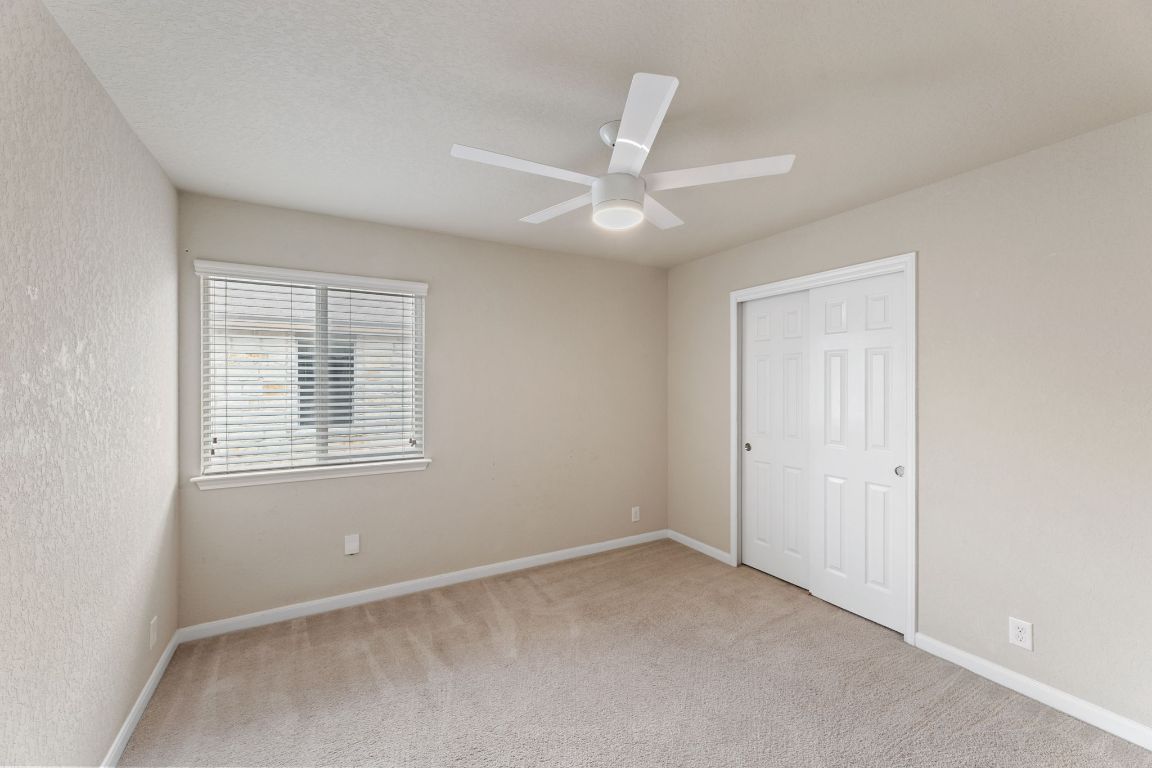 582 Briggs Drive New Braunfels, TX 78130 - Photo 28 of 32 a view of an empty room with a window