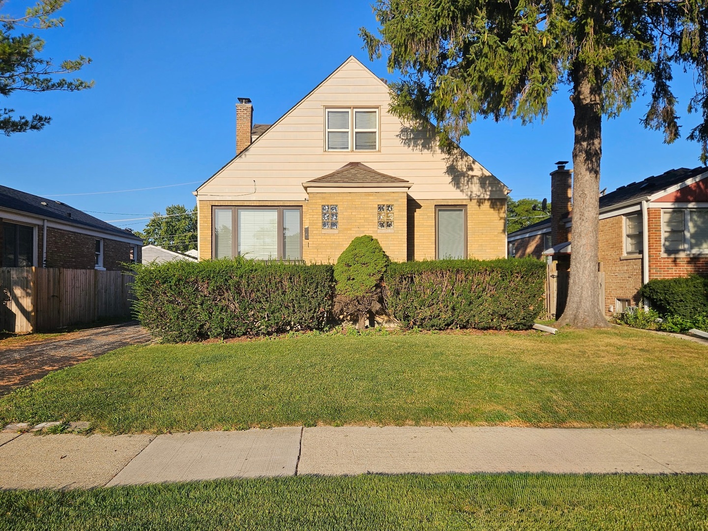 2436 Spruce Street River Grove, IL 60171 - Photo 1 of 19 a front view of a house with a yard
