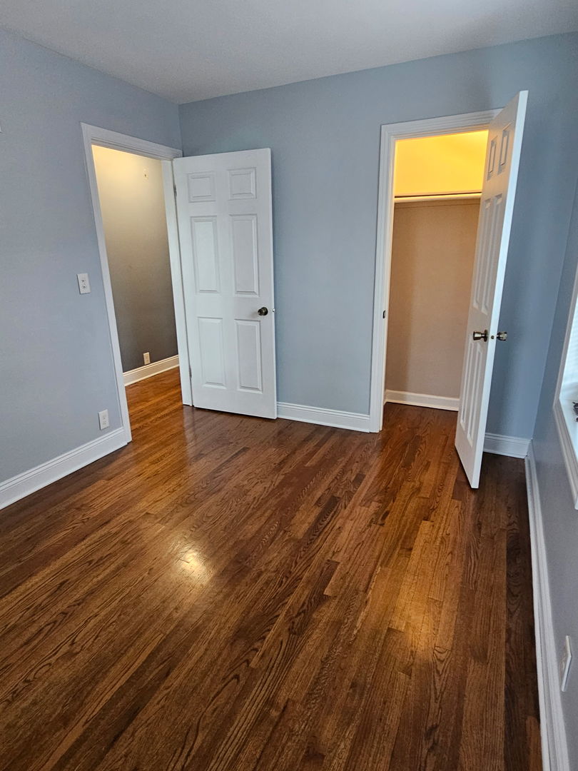 2436 Spruce Street River Grove, IL 60171 - Photo 11 of 19 a view of empty room with wooden floor