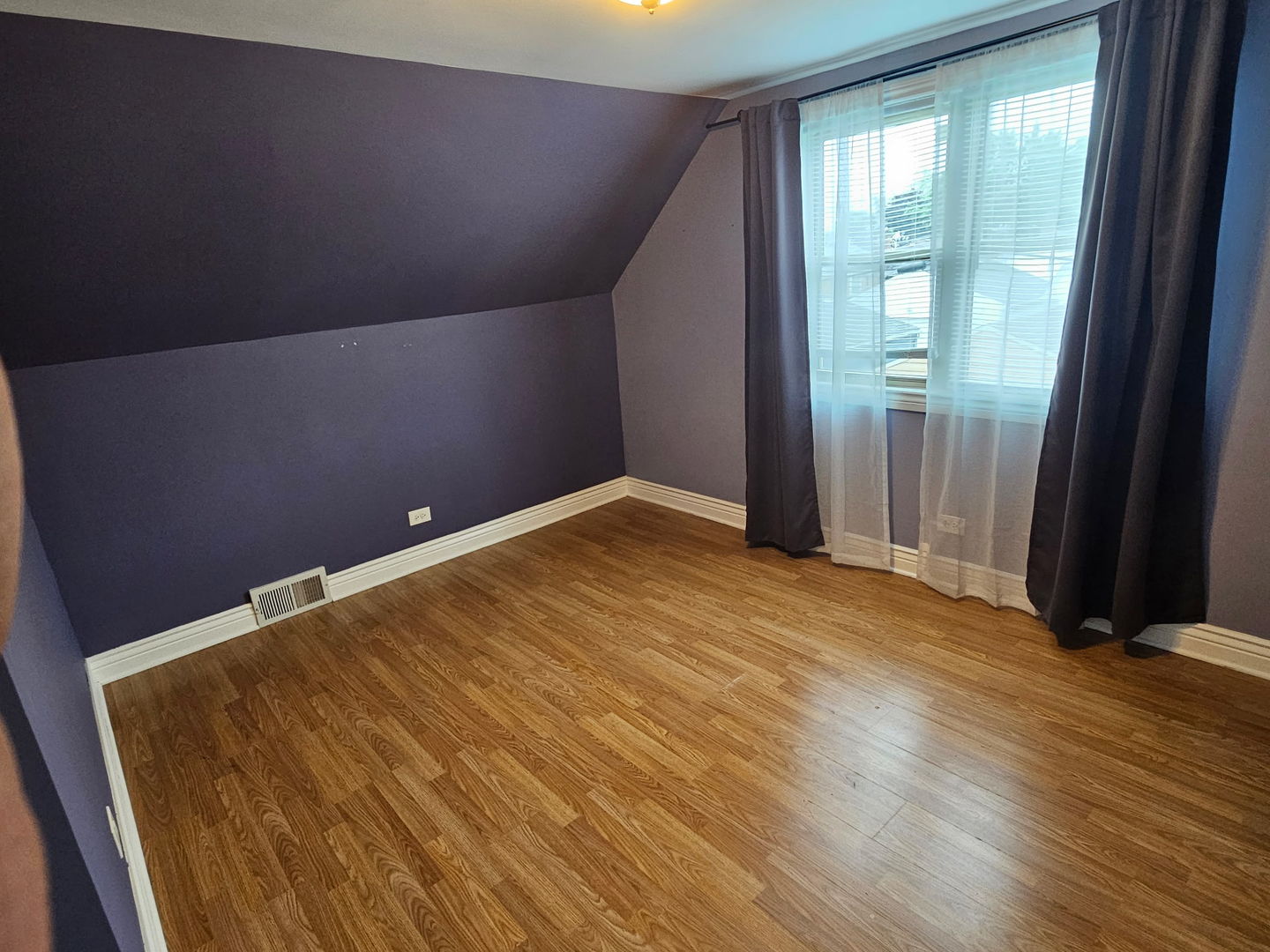 2436 Spruce Street River Grove, IL 60171 - Photo 13 of 19 an empty room with wooden floor and windows