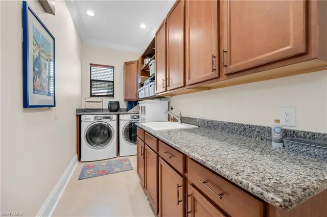 a storage room with washer and dryer