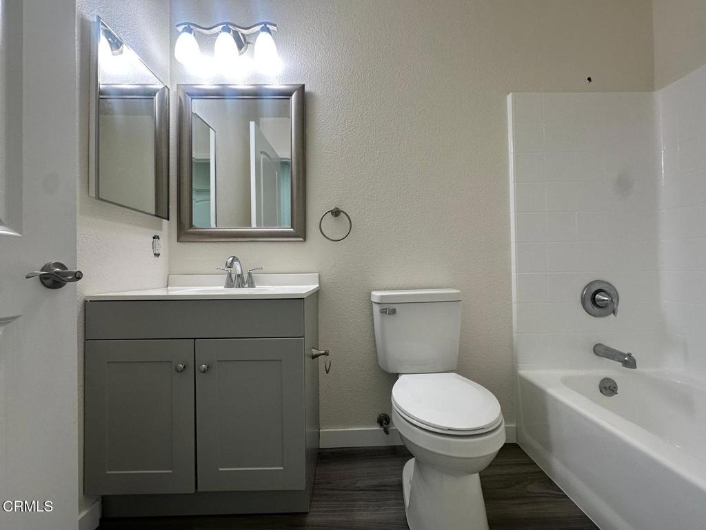 44839 16th Street East Lancaster, CA 93535 - Photo 38 of 53 a bathroom with a sink a toilet and shower