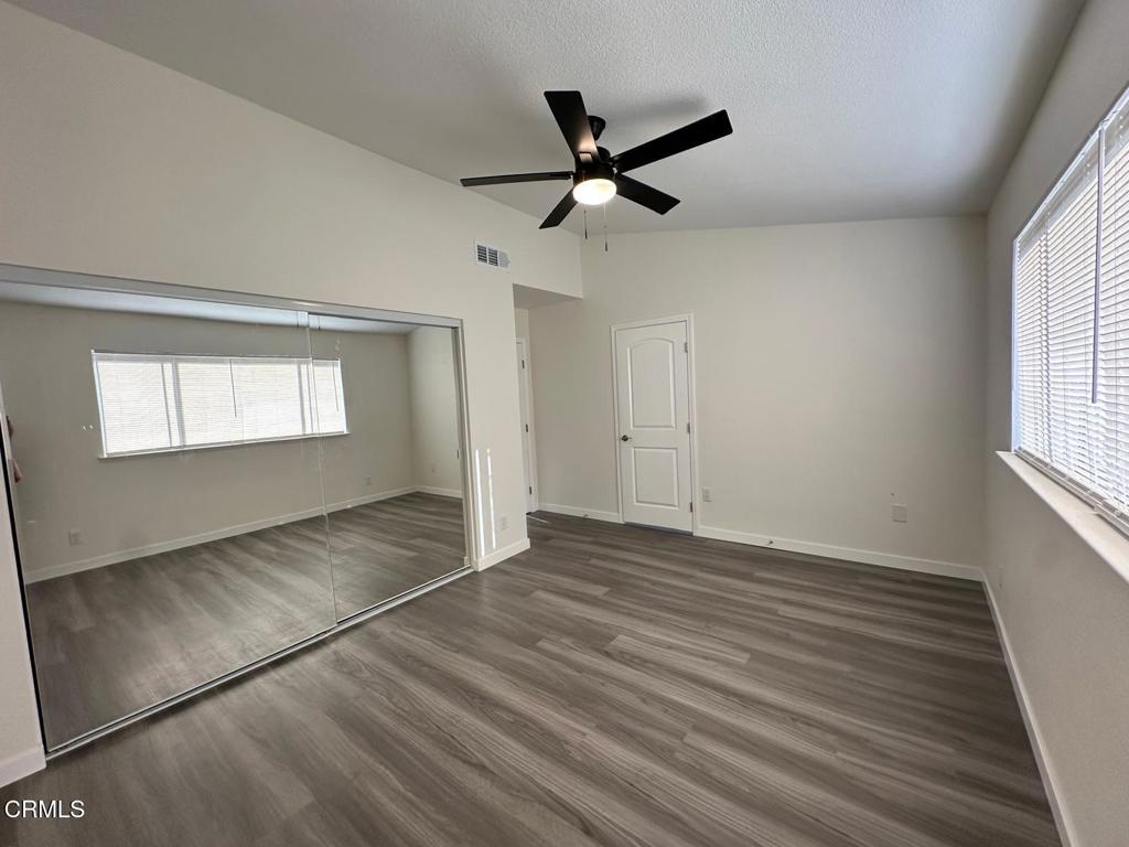 44839 16th Street East Lancaster, CA 93535 - Photo 47 of 53 a view of empty room with wooden floor and fan