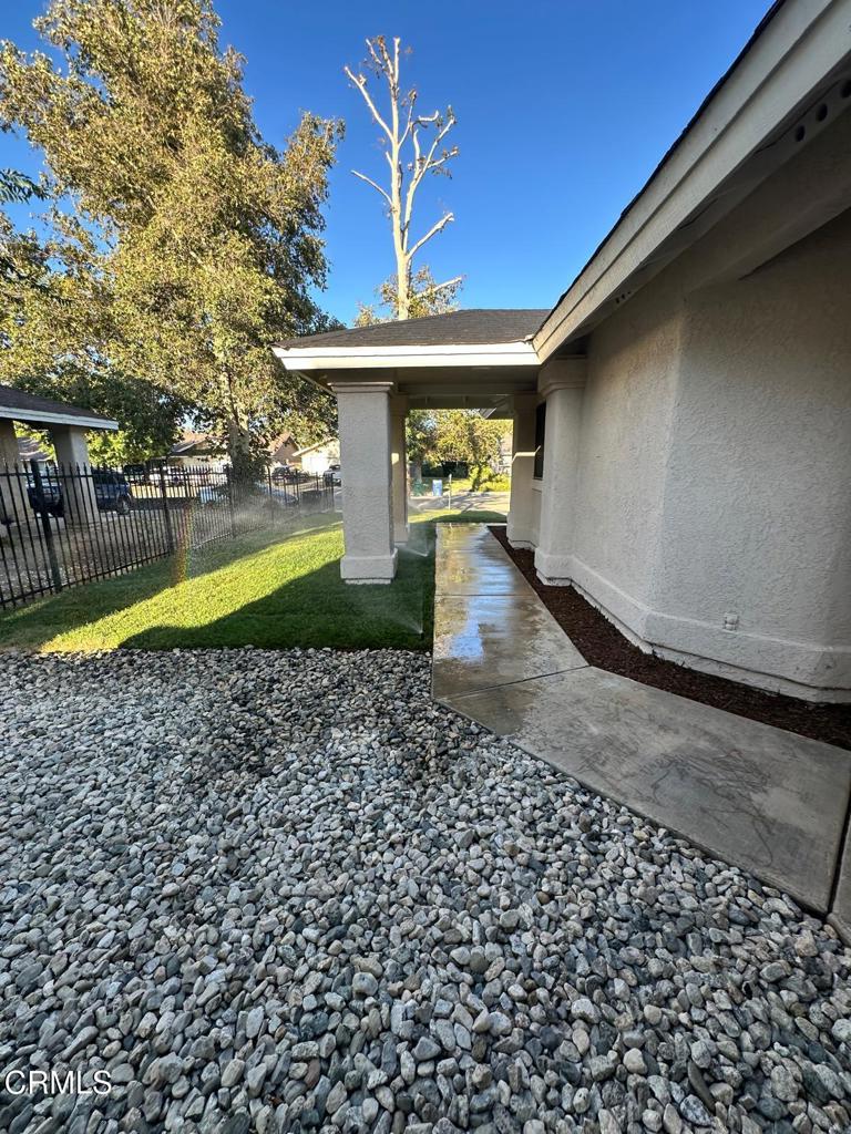 44839 16th Street East Lancaster, CA 93535 - Photo 7 of 53 a front view of a house with a yard