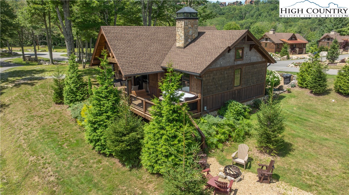 16 Camp Eagle Loop Banner Elk, NC 28604 - Photo 4 of 23 an aerial view of a house with a yard