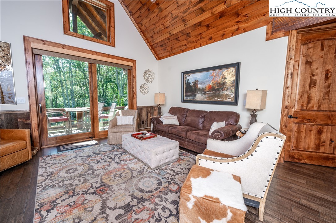 16 Camp Eagle Loop Banner Elk, NC 28604 - Photo 10 of 23 a living room with furniture and a large window