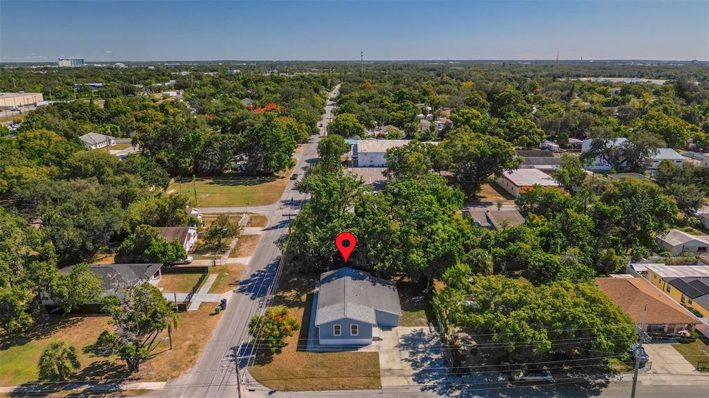 3723 Temple Street Tampa, FL 33619 - Photo 27 of 28 an aerial view of residential houses with outdoor space and swimming pool