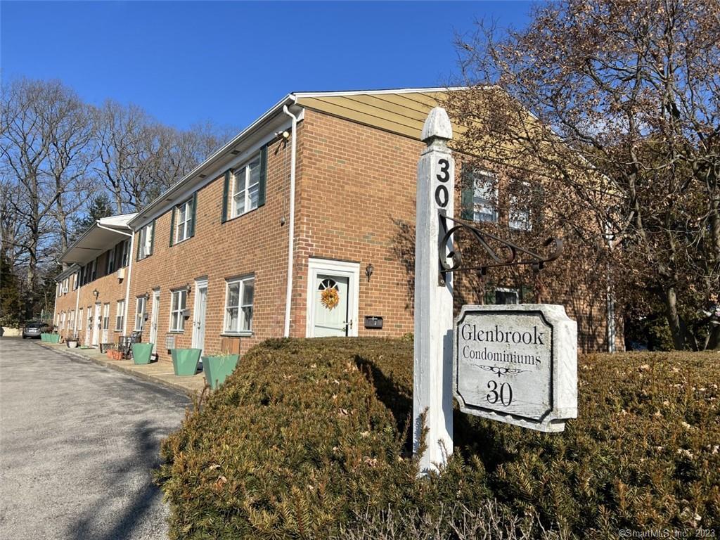 30 Maple Tree Avenue, Unit G Stamford, CT 06906 - Photo 1 of 1 a sign board on the side of a road