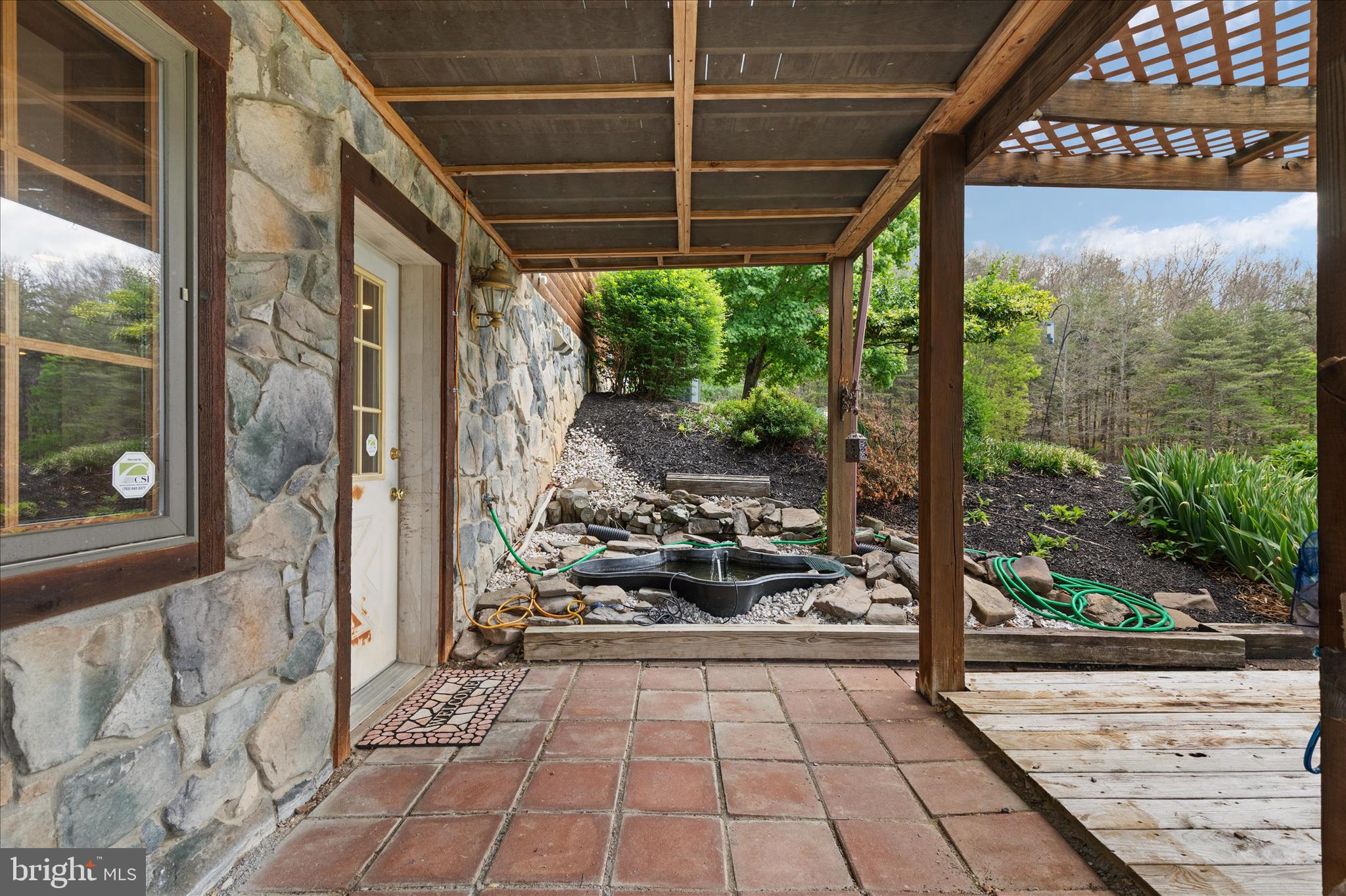 272 Buster Brown Drive Rio, WV 26755 - Photo 60 of 113 Walk-out Covered Patio to Koi Pond