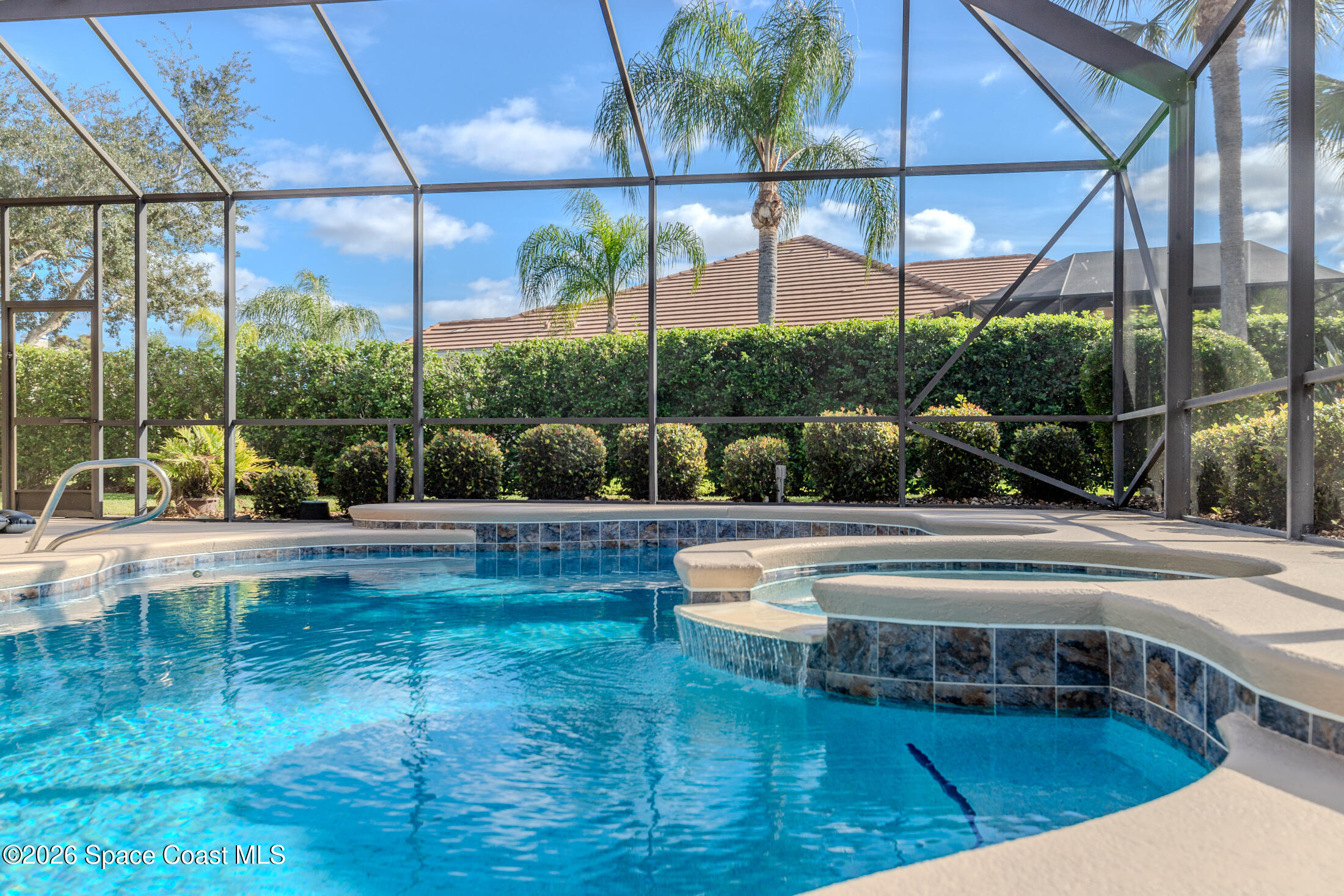 8201 Compton Way Melbourne, FL 32940 - Photo 5 of 52 a view of a swimming pool with a patio and a yard