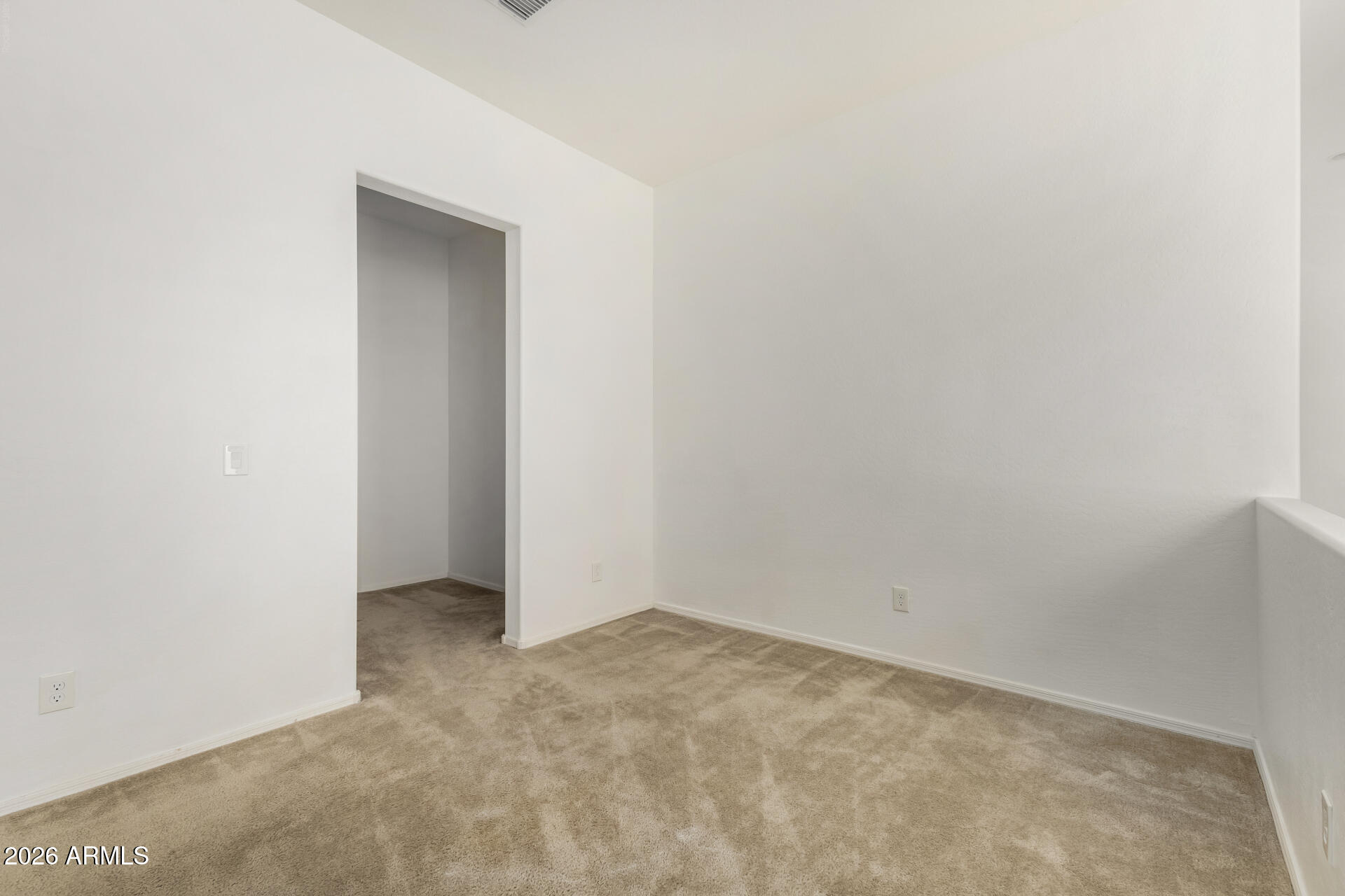 7358 West Phelps Road Peoria, AZ 85382 - Photo 13 of 28 a view of an empty room