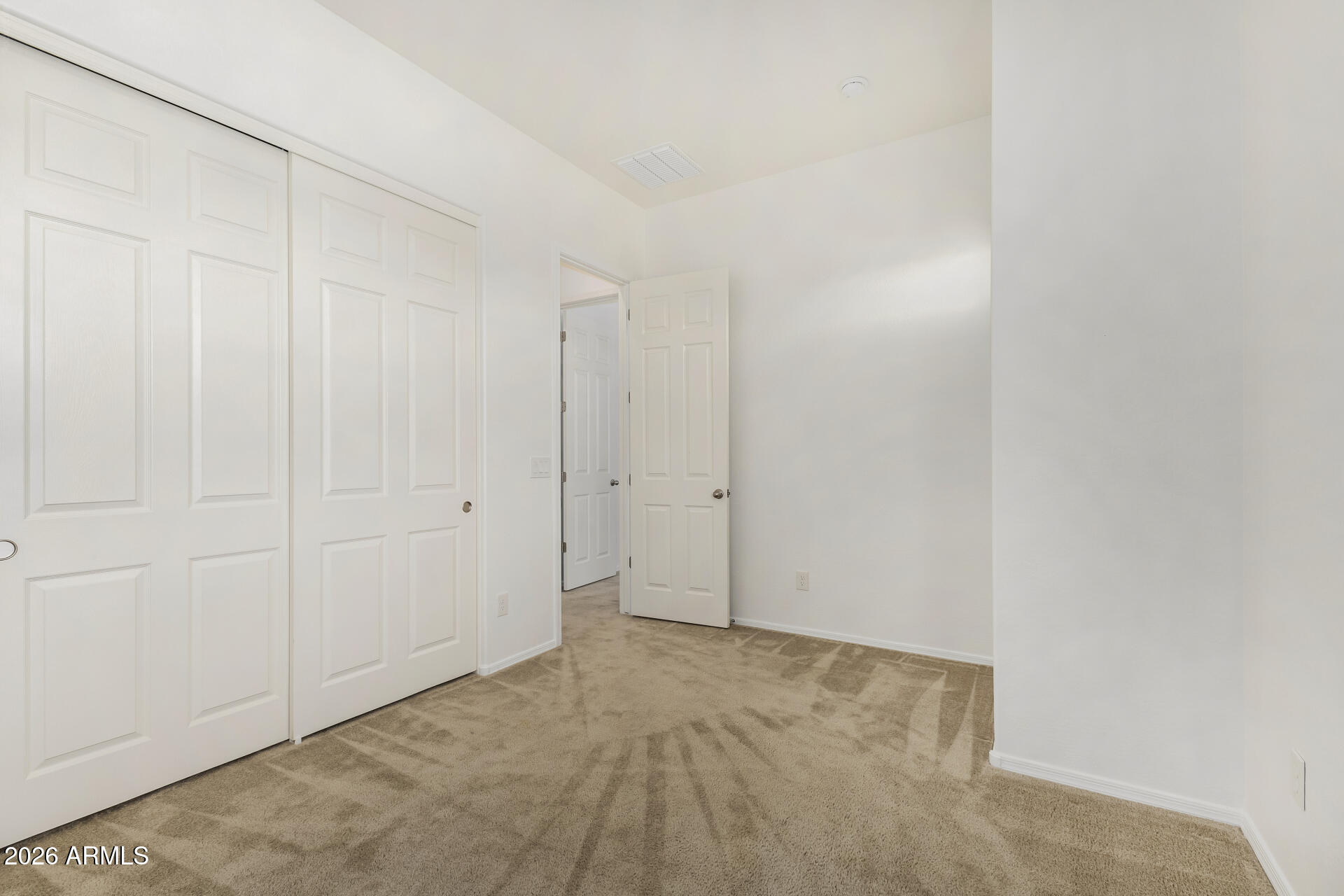 7358 West Phelps Road Peoria, AZ 85382 - Photo 19 of 28 a view of an empty room