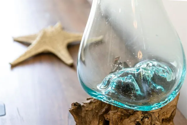 a kitchen with a table and chairs in it