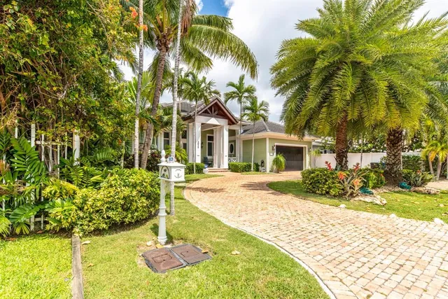 a view of swimming pool with a yard