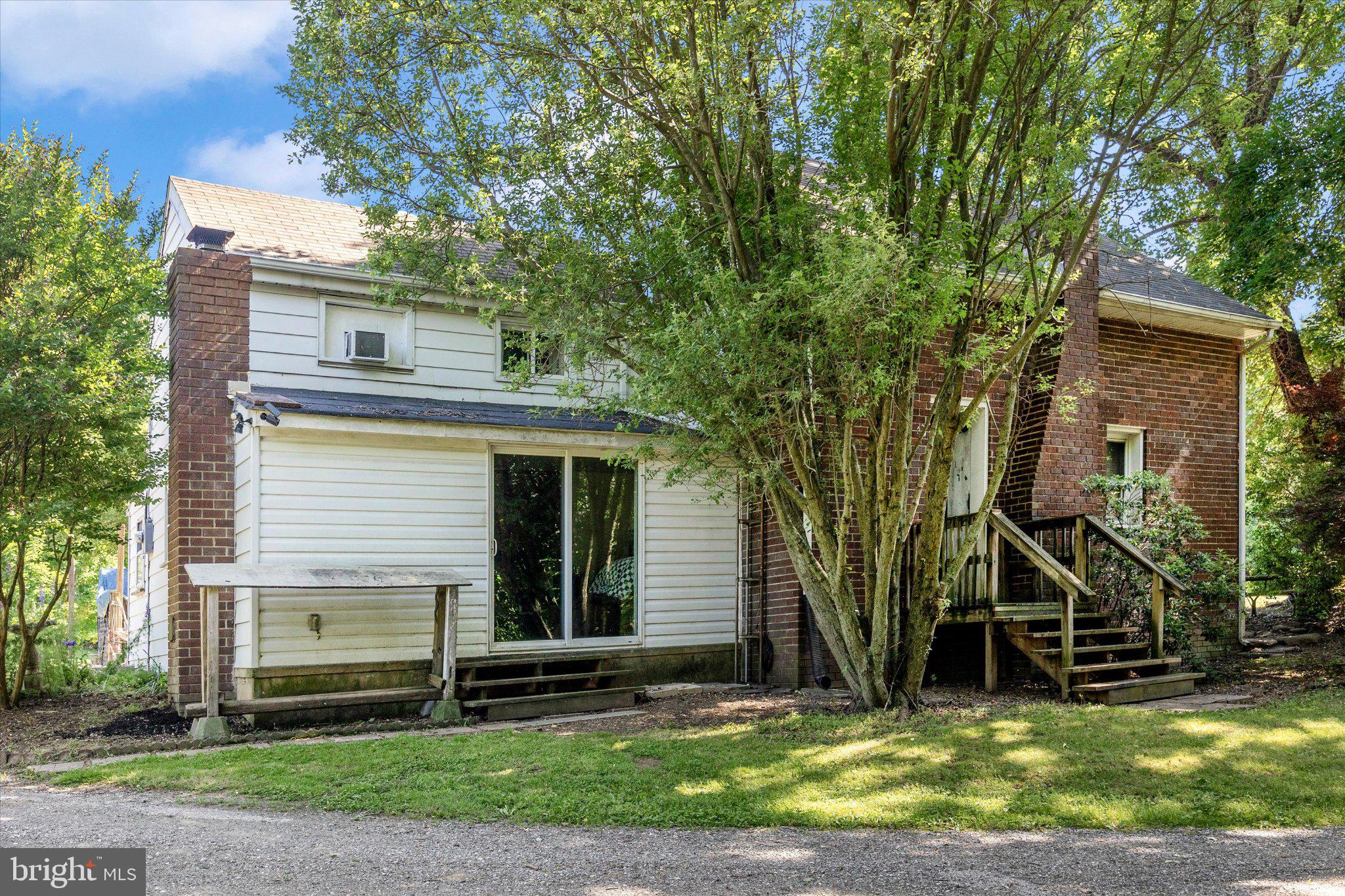 14721 Albert Staub Road Thurmont, MD 21788 - Photo 33 of 46 a view of a house with a yard